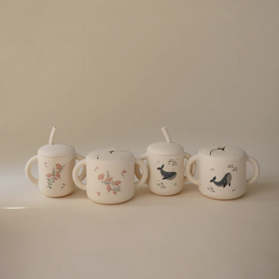 Mushie Copo Didático de Snacks Whales 6 Meses+ | Farmácia d'Arrábida