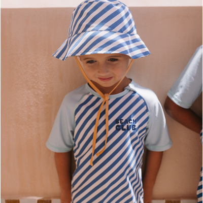 Monnëka Chapéu Reversível Stripes Blues & Beyond M 18-36 | Circunferência craniana 50-51 | Farmácia d'Arrábida